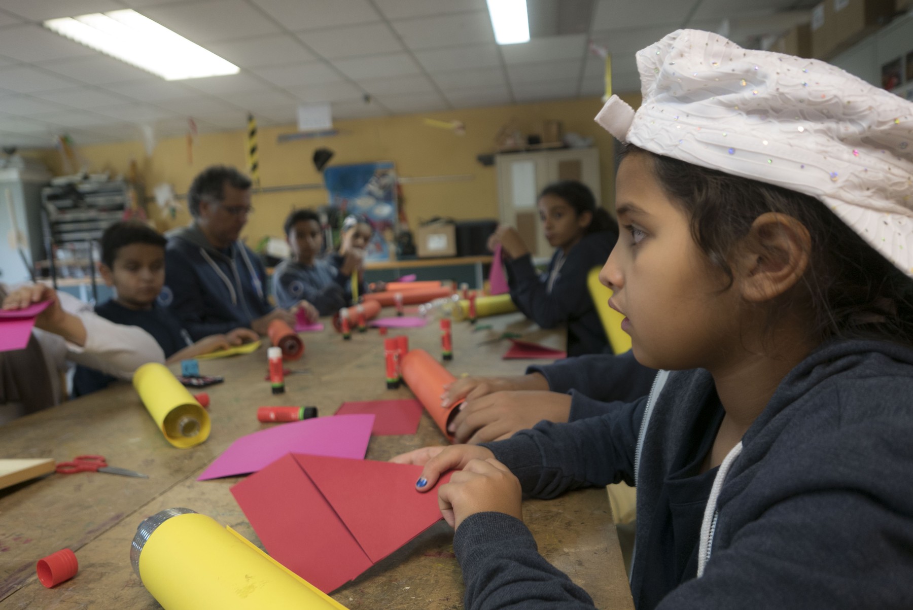 Students building rocket models in a bootcamp workshop